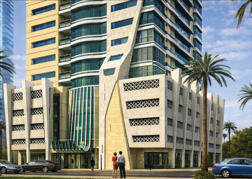 Azha View Residences Ajman illuminated at night – luxury high-rise tower with glowing balconies under a starlit sky