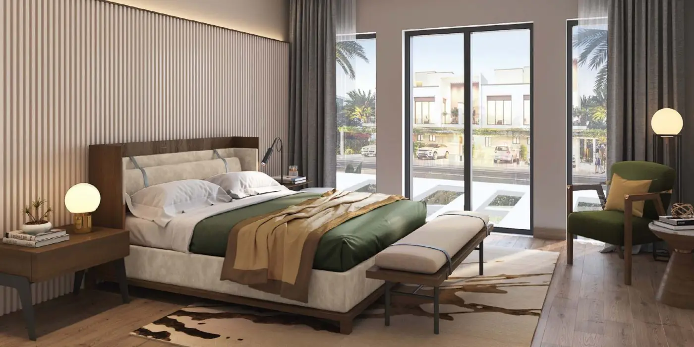 Modern bedroom in a UAE property for sale, featuring a minimalist design with teal accents, large windows, and a cozy ambiance, perfect for luxurious living.