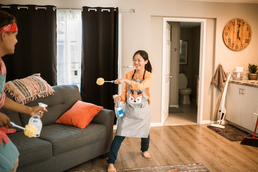 2 persons doing home maintenance chores in ajman according to the checklist