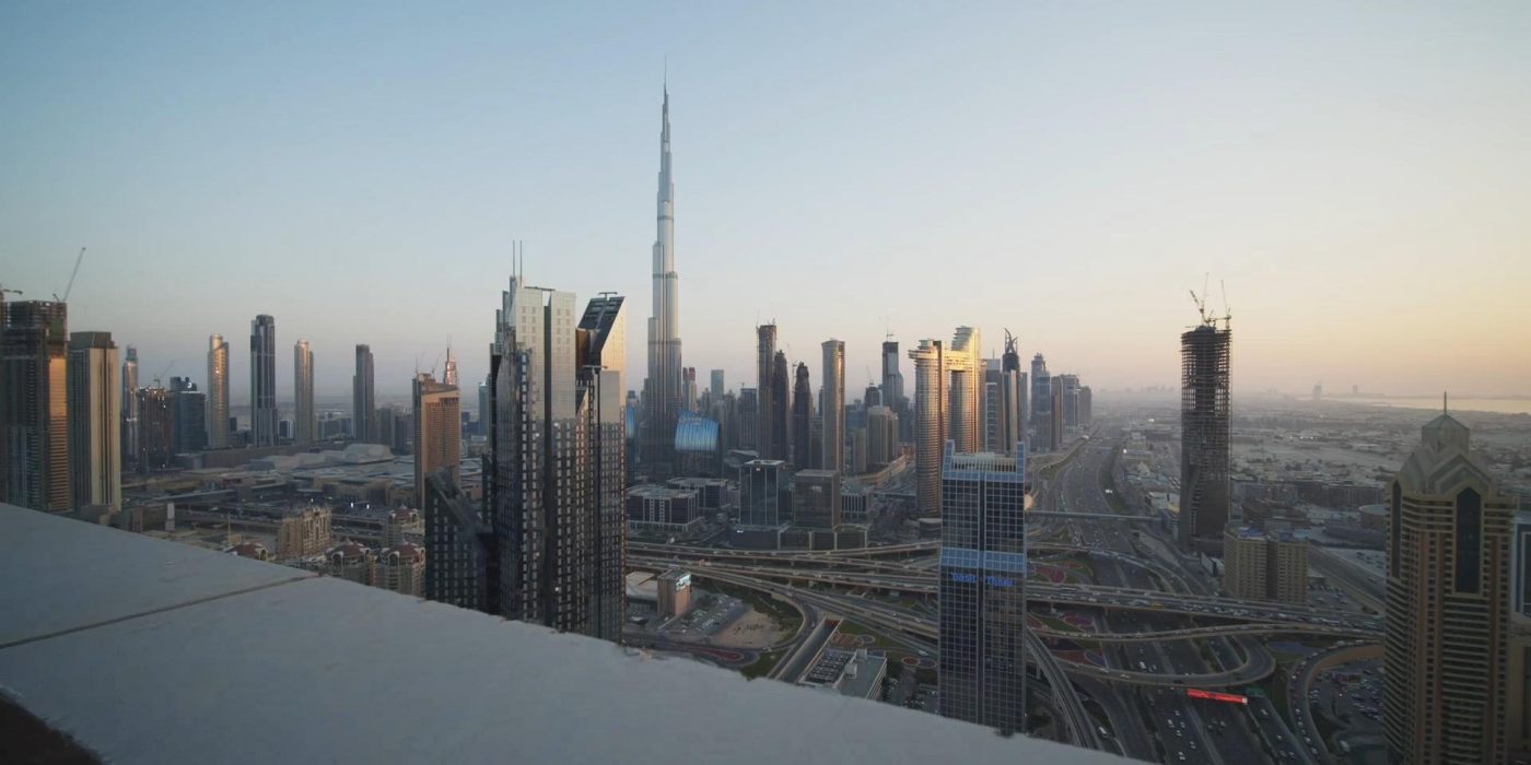 a dubai skyline with tall buildings represent affordable and luxury housing in dubai