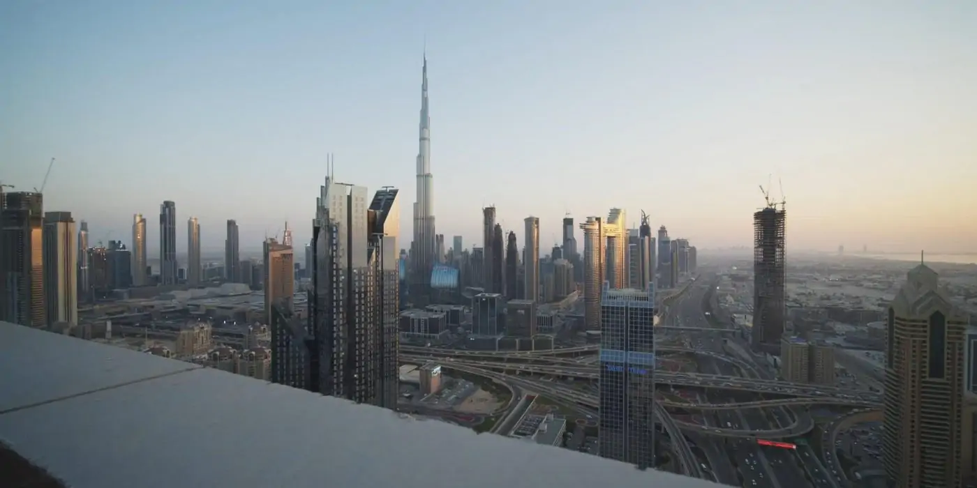 a dubai skyline with tall buildings represent affordable and luxury housing in dubai